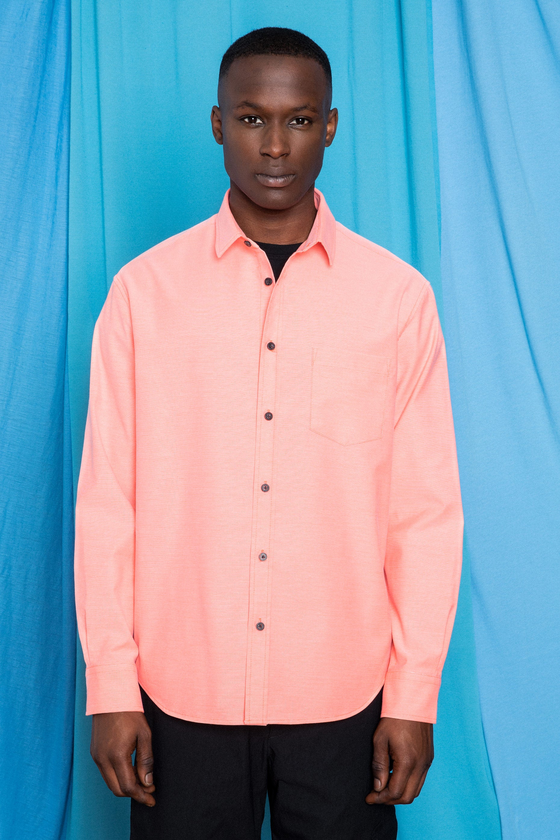 Full front fit image of Torey wearing the Experiment 253 - Fluoro Boxford in Coral