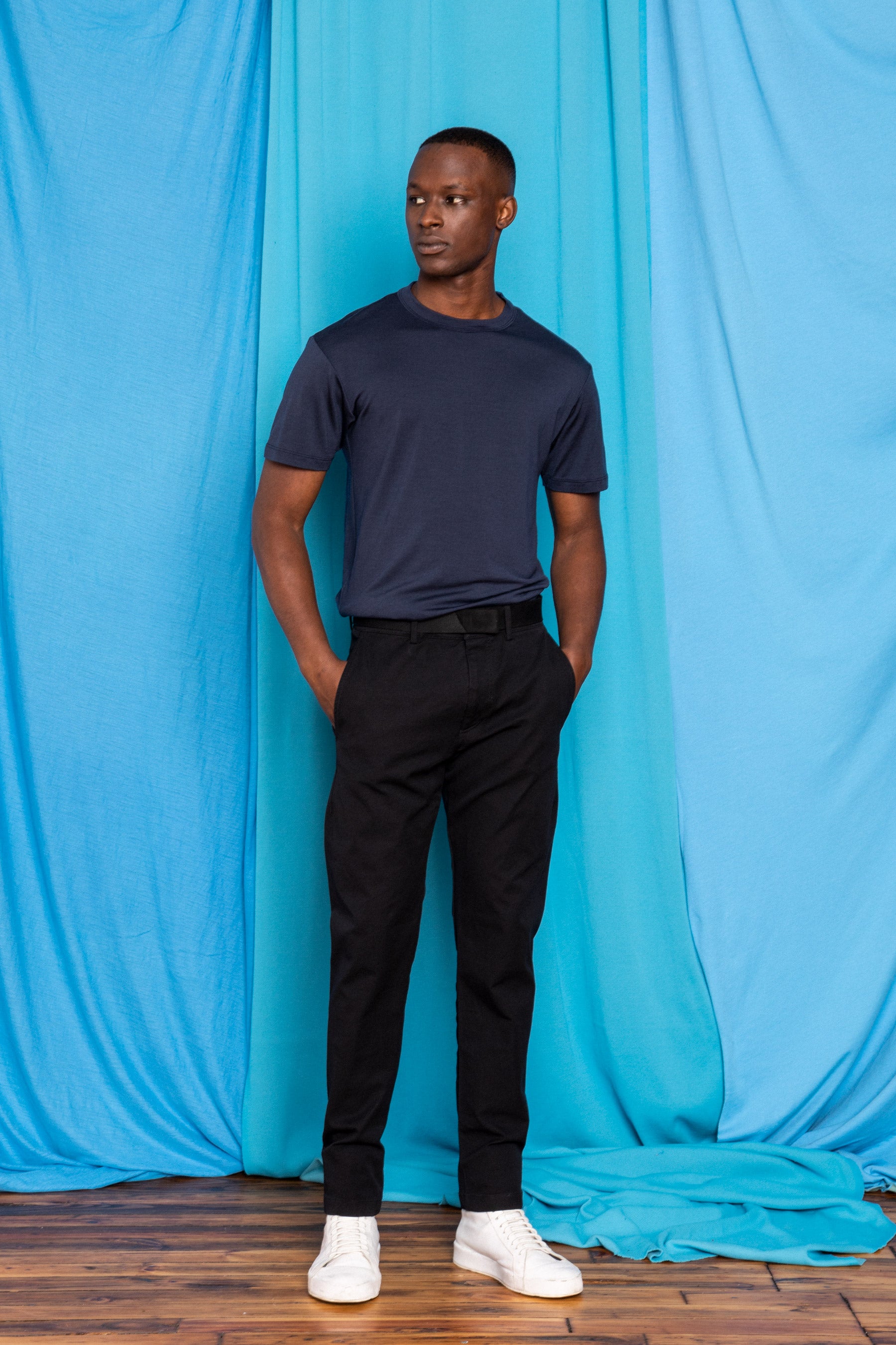Torey in the Black Free/Co Darts, Navy Ultrafine Merino Cut Two T-Shirt, and Polyamour Belt, front view