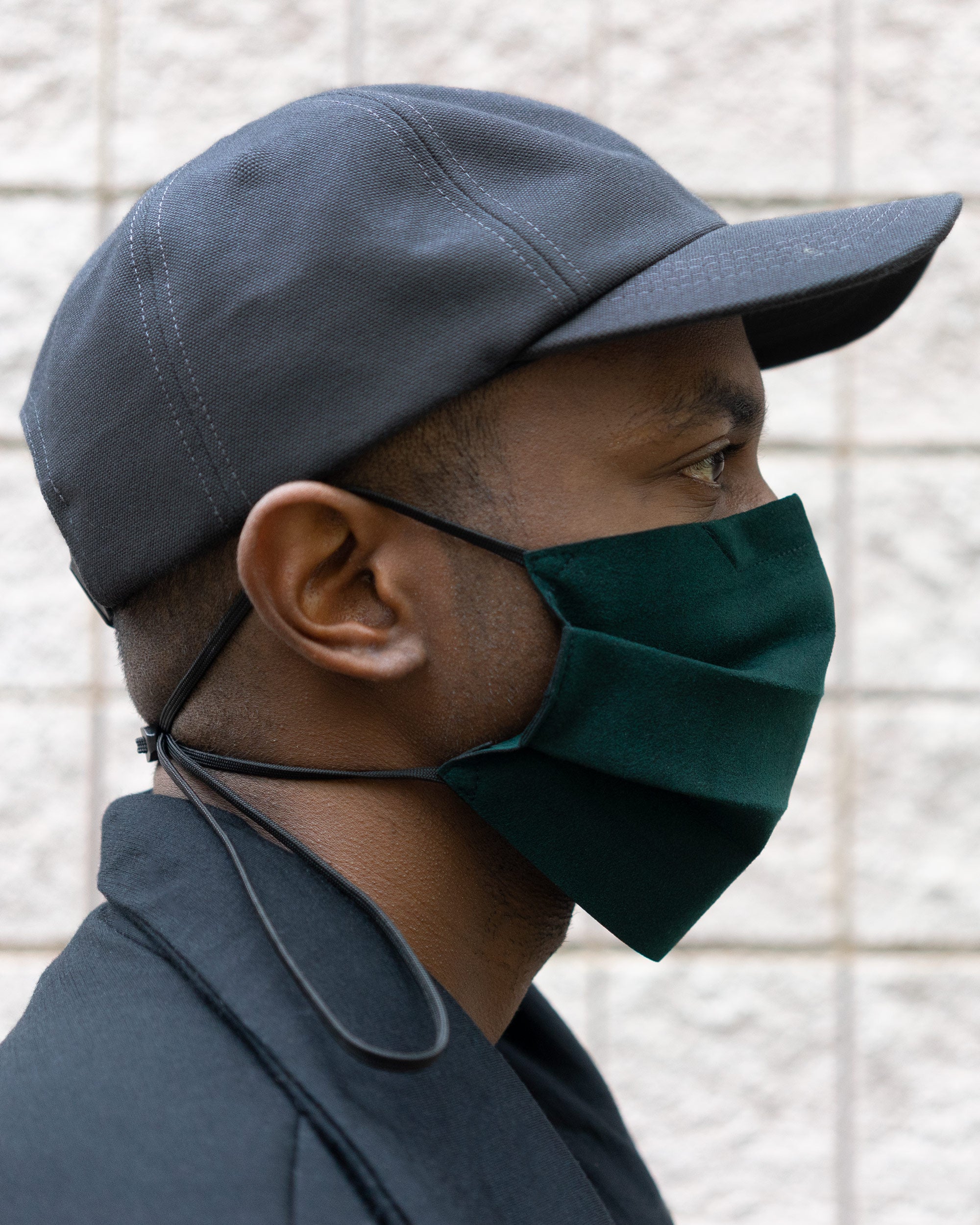Darren in the Charcoal Duckcap and a Dark Green Mask 004, profile view